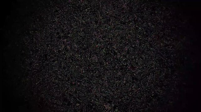 Abstract texture background with subtle shimmering specks, generating a mysterious and dynamic visual effect in a dark digital environment.