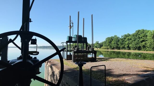 Historical mechanism of water locks on Rožmberk pond in the Czech Republic
