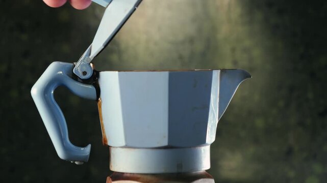 Italian metallic coffee geyser maker. Mocha coffee pot for making espresso coffee