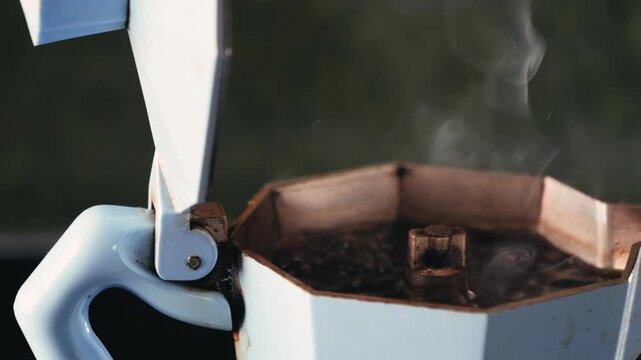 Italian metallic coffee geyser maker. Mocha coffee pot for making espresso coffee