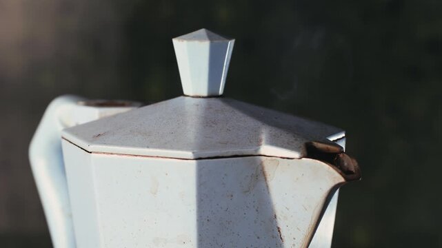 Italian metallic coffee geyser maker. Mocha coffee pot for making espresso coffee