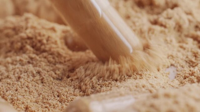 Ashwagandha Indian Ginseng Powder in White Bowl isolated on white background, superfood close up. 