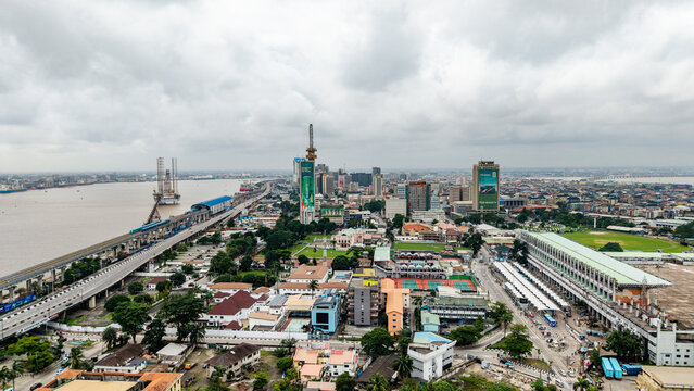 Aerial view of Lagos Island featuring the cityscape, modern buildings, the bridge over the lagoon, and urban infrastructure in Lagos, Lagos, Nigeria.