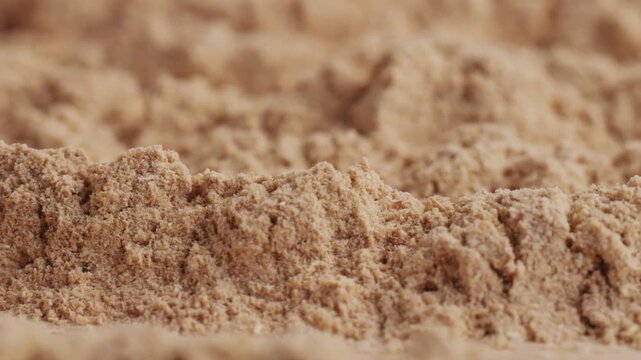 Ashwagandha Indian Ginseng Powder in White Bowl isolated on white background, superfood close up. 