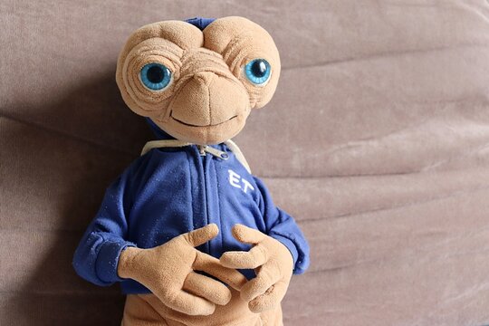 Salvador, Brazil - August 7, 2026: A toy figure of E.T. the Extra-Terrestrial wearing a blue hoodie. ET from Universal Pictures. 