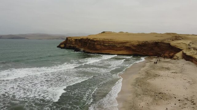 Aerial view of la catedral cliff and beach in paracas, peru