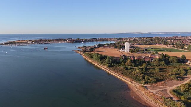 Aerial drone footage of the University of Portsmouth Langstone Campus in Hampshire, England, showcasing university buildings, sports facilities