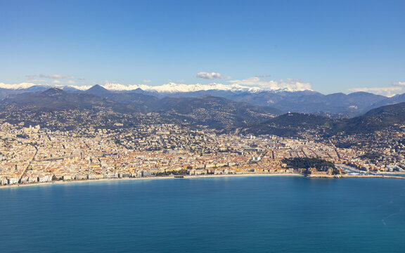 Aerial view of the French Riviera coastline featuring the city of Nice with its dense urban architecture and the Mediterranean Sea, Nice, Provence-Alpes-Cote d'Azur, France.