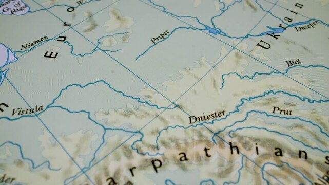 close up gliding shot toward the carpathians on a relief map