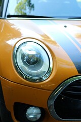 Close-up photo of vintage automobile car light front side retro style picture   © Elena K