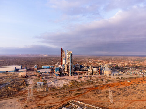 Aerial view of the Simba Cement Merueshi plant featuring industrial silos and chimneys set against the arid landscape of Kajiado, Kajiado County, Kenya.