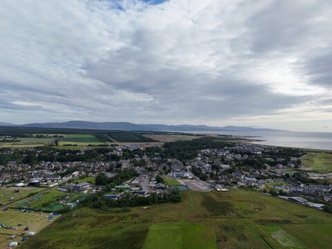Dornoch is a charming Highland town beside the Dornoch Firth, celebrated for its medieval cathedral, historic castle, coastal views, and bright skies.