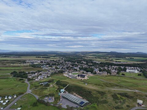 Dornoch, northern Scotland, sits in Sutherland beside Dornoch Firth; its 1224 cathedral and 1509 castle define this historic Highland town.