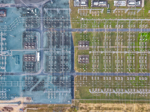Aerial view of the Brendale BESS electrical substation featuring high voltage power lines, transformers, and industrial infrastructure in Brendale, Queensland, Australia.