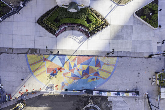 Aerial view of the Spirit of Detroit statue and the colorful geometric mural on the plaza in Detroit, Michigan, United States.