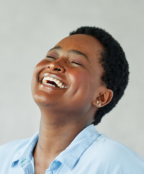 Portrait of a smart young happy afican american businesswoman or student or young woman girl in the office or a classroom. Startup and succesful business concept