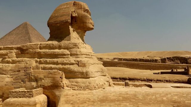 sphinx and pyramidGreat Sphinx of Giza with Pyramid in Background Egypt
