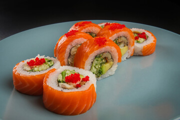 Angle Close-Up of Salmon Sushi Rolls with Red Tobiko © Ilias