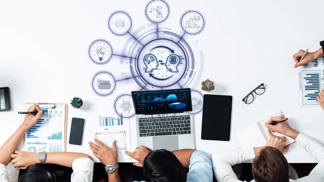 A diverse team collaborates over digital analytics, surrounded by data charts and a laptop, showcasing modern workplace dynamics and collaborative strategies. Raster