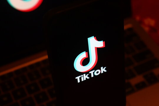 TikTok official short-form video hosting service and social networking platform corporate brand identity. This digital application provides global users with viral media content creation.