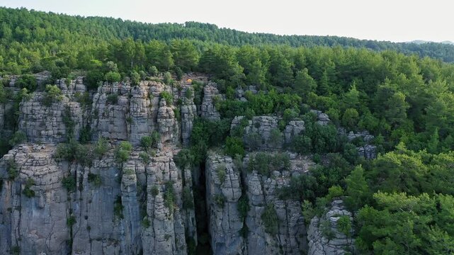 Tazi Canyon aerial view in Manavgat Antalya Turkey. Spectacular drone shot capturing majestic rock cliffs and deep gorge surrounded by green pine forest.