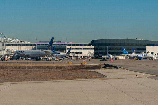 IAH, Houston, Texas, USA - January 10, 2024 - Multiple United Airlines aircraft including a 737 a 777 and an Airbus 319 on the ramp at IAH in Houston