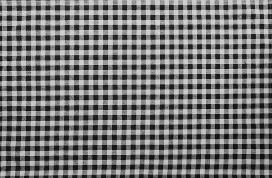 texture of white black checkered fabric pattern background. traditional tablecloth checkered as backdrop. top aerial view. Merry christmas happy New year holiday Holiday event