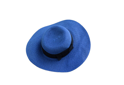 Bright blue woven sun hat with wide brim and black ribbon bow detail isolated cutout on transparent