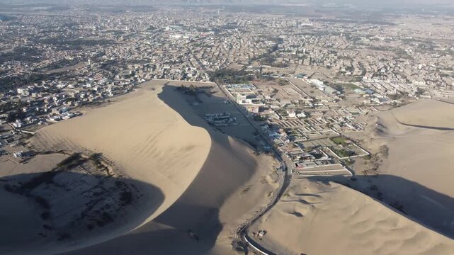 Aerial view of huacachina oasis and ica city in peru