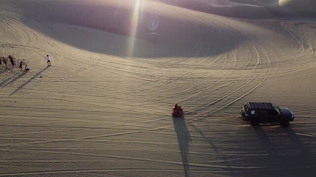 Aerial view of dune buggy adventure in huacachina desert