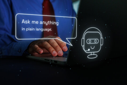 User typing on laptop, engaging with a virtual assistant, receiving automated responses and help