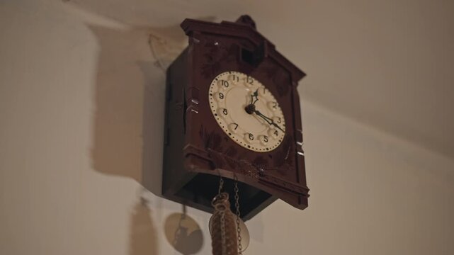 Closeup cuckoo clock face under shadow, aged dial with patina, ornate woodwork, dangling weight and chain, dramatic side lighting, cinematic grain, museum restoration vibe, suspenseful quiet