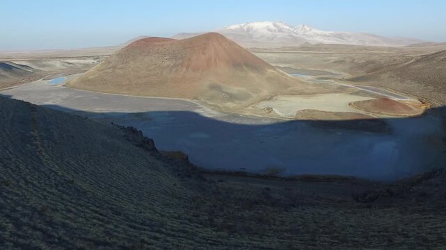 Aerial drone view shows Meke Lake volcanic crater and tuff ring formation in Konya Turkey.