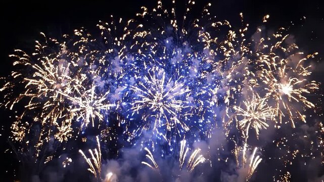 Stunning golden fireworks display lighting up the night sky during a festive celebration