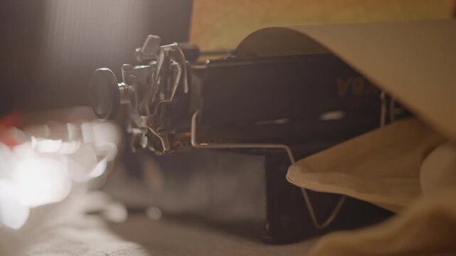 Writing setup with warm ambiance. Poetry composer in soft illuminated atmosphere surrounded by cloth and paper. Tranquil corner where writer pauses at typewriter amidst gentle fabrics and paper