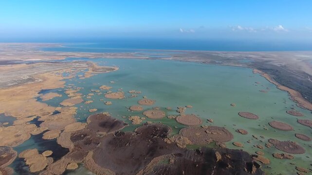Aerial panoramic view of reed covered coastal lagoon lake in Goksu Delta Mersin Turkey.