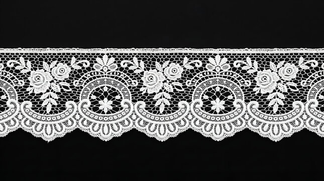 Elegant white floral lace trim with intricate rose and leaf patterns on a dark background, ideal for fashion, craft, and decorative textile projects