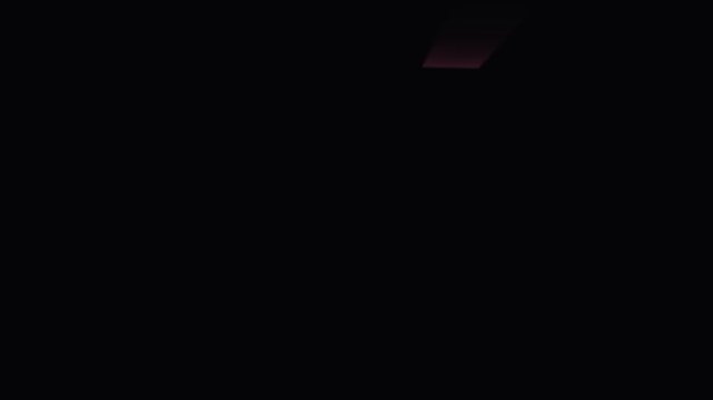Abstract glowing embers floating slowly in dark cinematic motion during nighttime fire sequence
