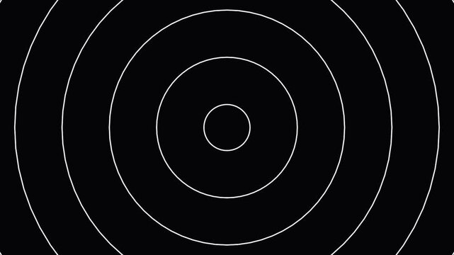 Concentric Circles Expanding Outward in a Dynamic Sequence Against a Dark Background