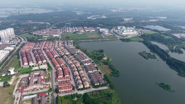 Aerial view shows a residential neighborhood with red-tiled roofs at Kampar