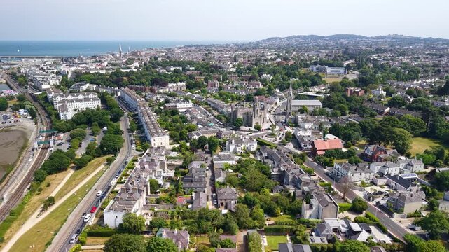 Dublin drone cityscape of Dun Laoghaire on seaside, sunny day in Ireland.