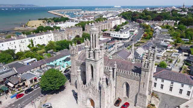 Cinematic aerial around Monkstown Church of Ireland historical building in Dublin, Dun Laoghaire.