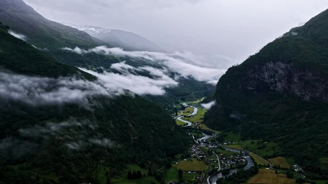 A Breathtaking View of Misty Mountains, Winding Rivers, and Peaceful Valleys Surrounded by Nature&rsquo;s Beauty in Fl&aring;m, Aurland, Norway - Hyperlapse