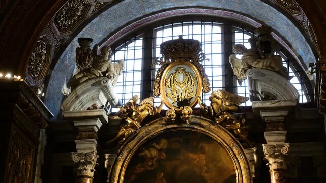 baroque chapel st john's co cathedral valletta angelic sculptures gilded emblems light streams arched window malta Girolamo Cassar architecture internationally recognized heritage site 16th