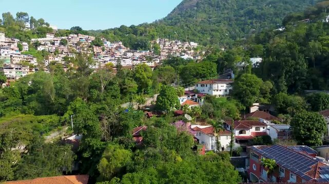 Drone view of Cosme Velho residential neighborhood and hillside favela in Rio de Janeiro, Brazil