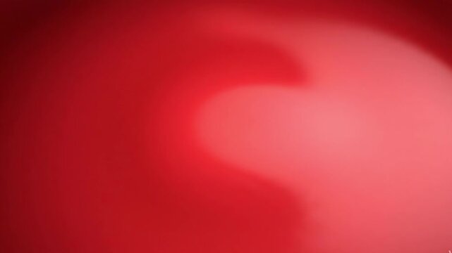 Closeup of luxurious red velvet fabric texture with soft lighting