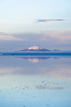 Volcano reflected on the Salar de Uyuni, Bolivia