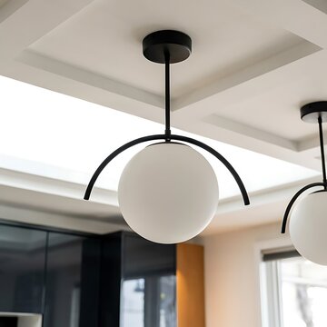Modern spherical glass globe pendant ceiling light fixtures in a contemporary room