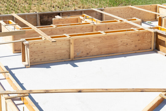 Construction work on a house foundation: slab foundation, concrete, floor concrete