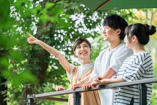 A group of men and women refreshing themselves in nature during holidays and summer vacation.